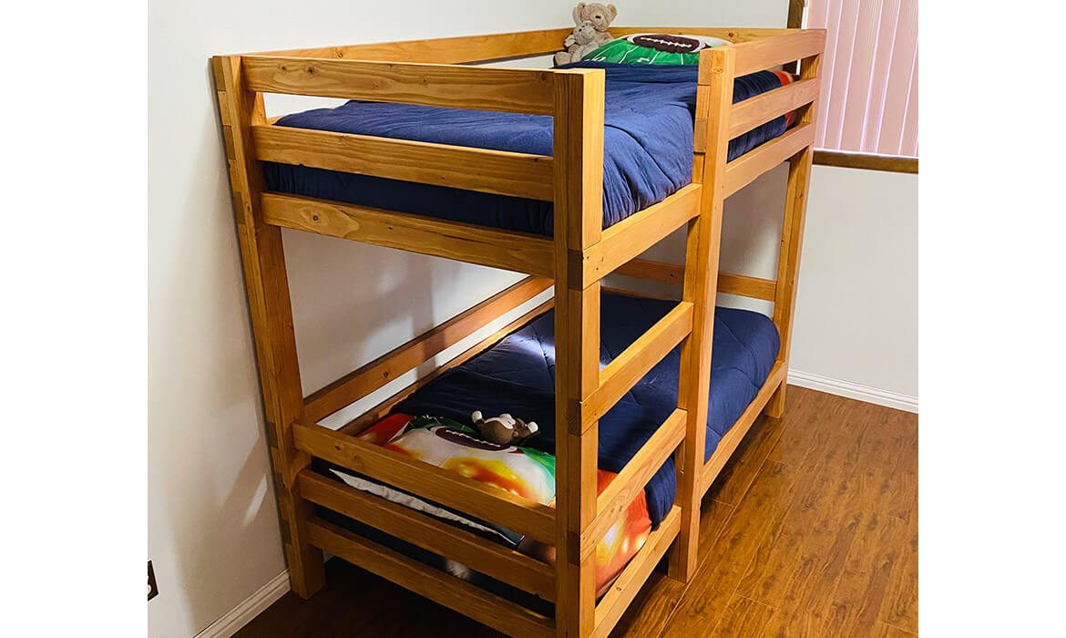 Child's wood twin bunk bed